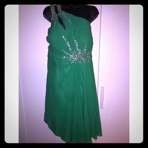 Emerald green chiffon looking like money prom gown